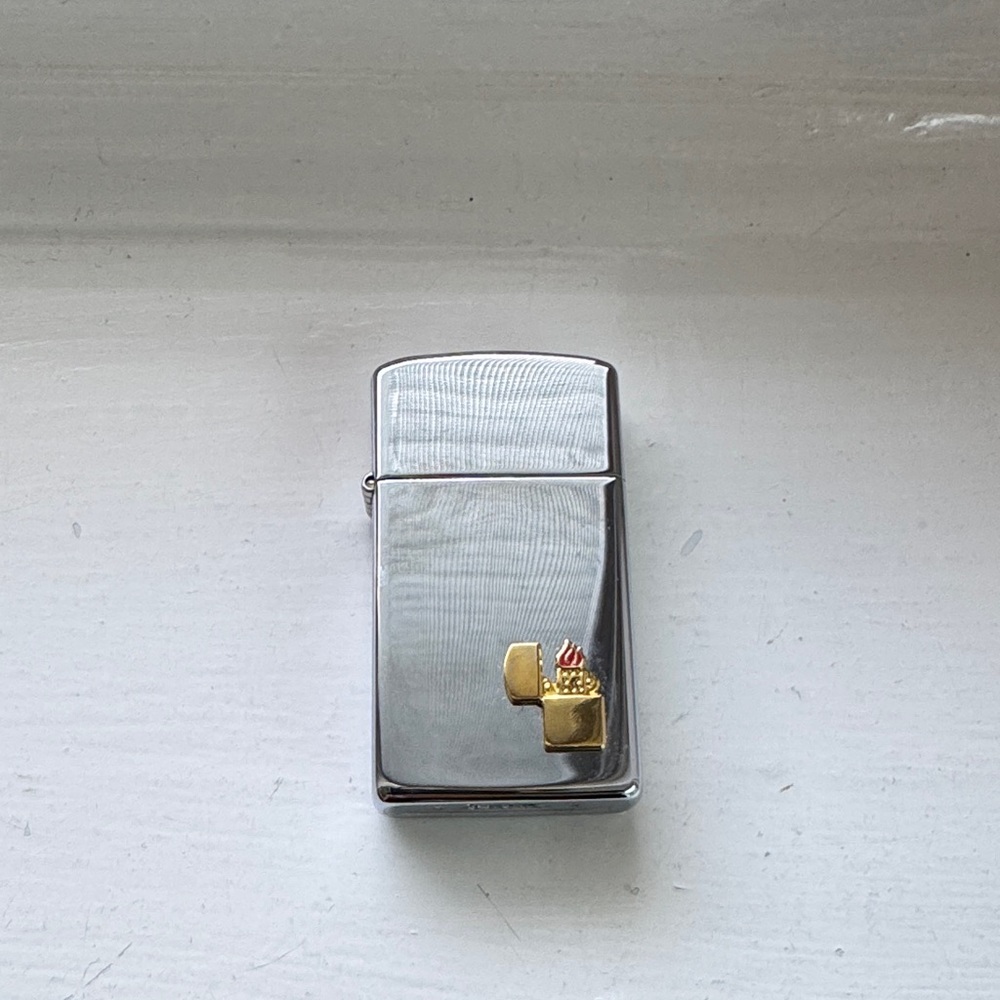Zippo Vintage Unique Silver Lighter with Gold Accent